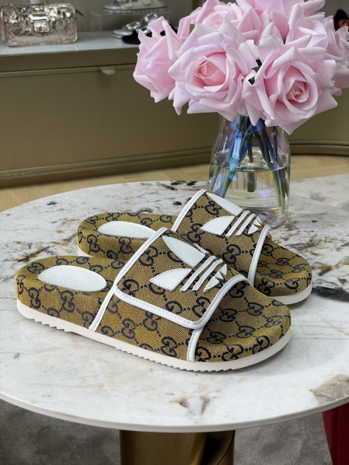 gu x a*d*das sandal